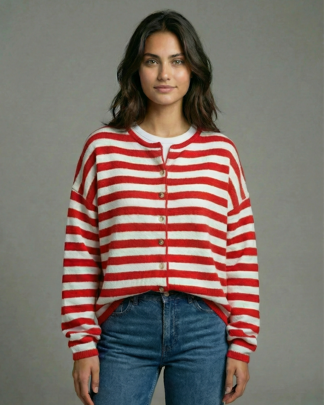 Woman wearing a red and white striped sweater with blue jeans jojo and coco boutique